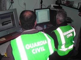 La Guardia Civil dee Oviedo detiene a tres implicados en tráfico pedófilo en la red