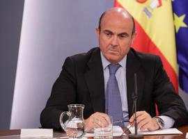De Guindos pregunta cómo se imputa la ayuda a la compra de la CAM por un banco catalán