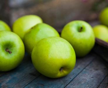 A la rica manzana de aquí!