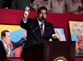 El CNE atribuye a Maduro el 50\66% y a Capriles el 49\7% entre clamores de fraude