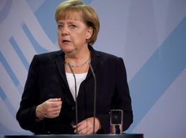 Merkel desea éxito al ambicioso paquete de reformas de Francia 