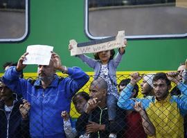 Marcha en tren desde Oviedo a Gijón de la Red Asturiana de Familias de Acogida de Refugiados 