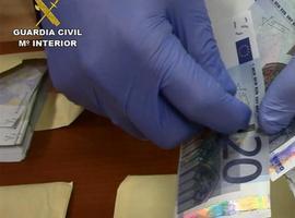 La G.C. investiga a un joven ovetense por pasar billetes falsos en Lugo